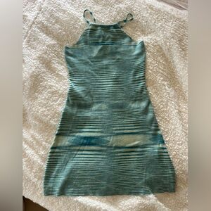 blue mini dress with open back and adjustable straps
